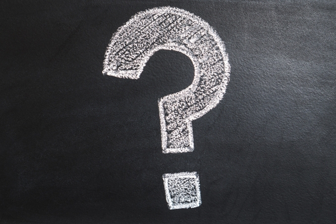 Chalk question mark on a blackboard